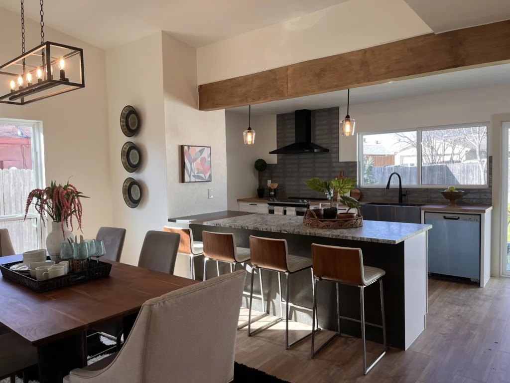 Dining room renovated by BMI Design & Decor in Texas, with wood furniture.